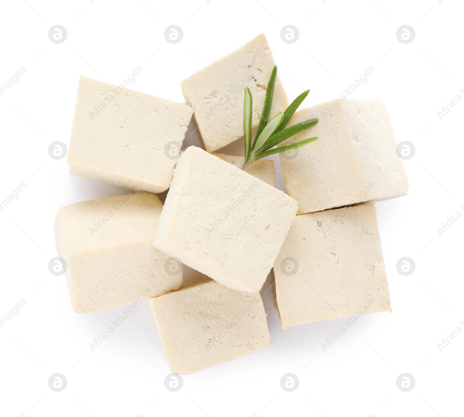 Photo of Delicious tofu and rosemary on white background, top view