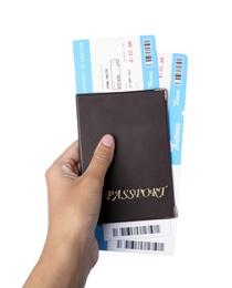 Photo of Woman holding passport with tickets on white background, closeup. Travel agency concept