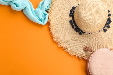 Photo of Flat lay composition with stylish summer hat on color background