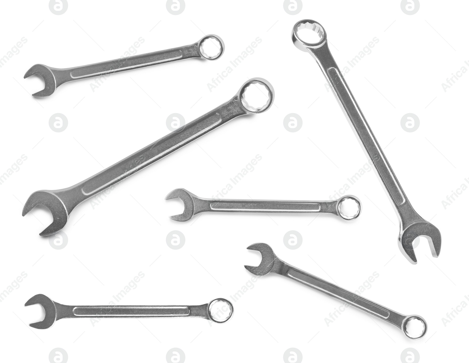 Image of Set with new wrenches on white background. Construction tools