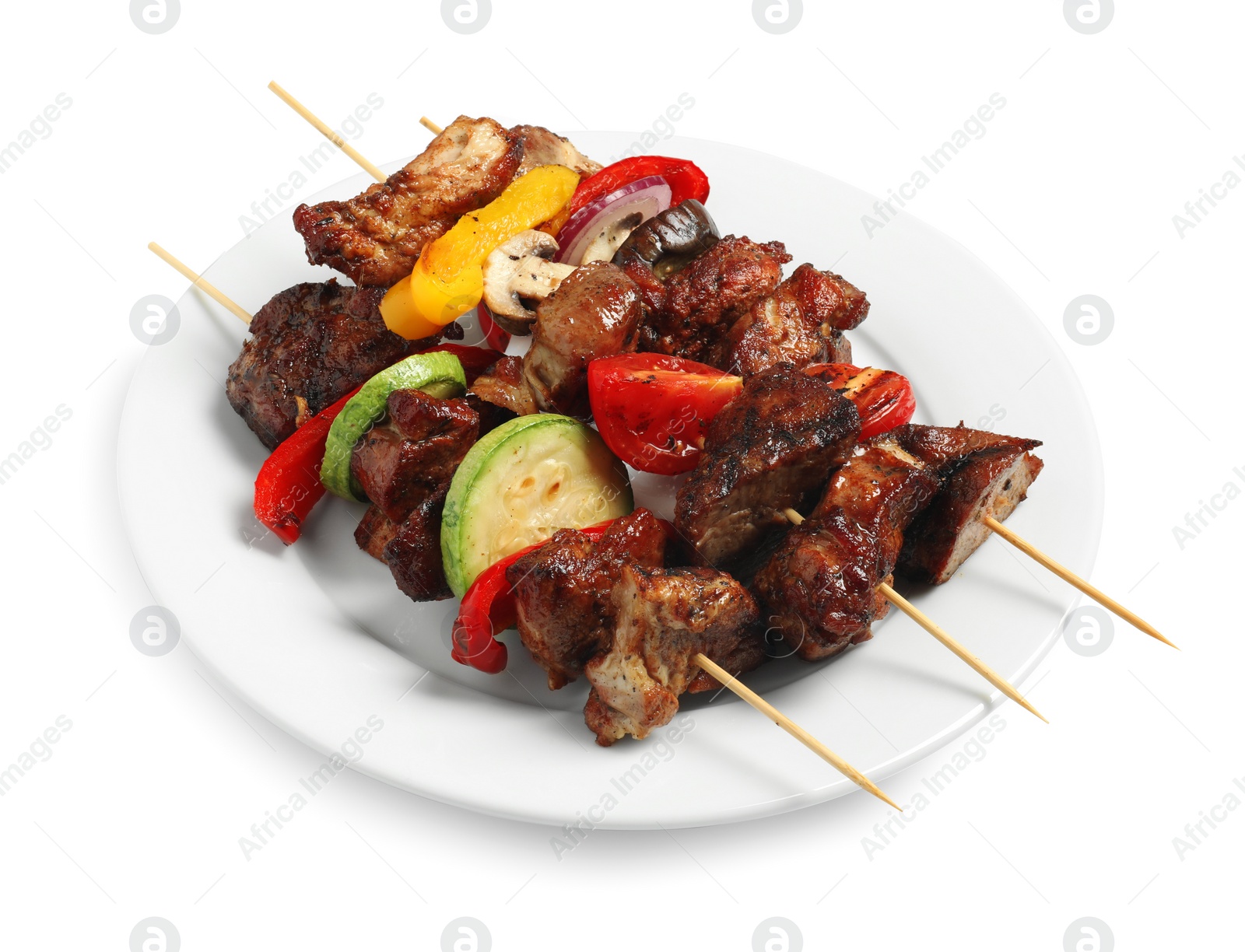 Photo of Delicious shish kebabs with vegetables isolated on white