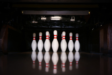 Photo of Bowling alley lane with set pins in club