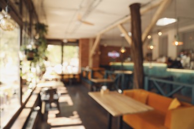 Blurred view of cafe interior with bokeh effect