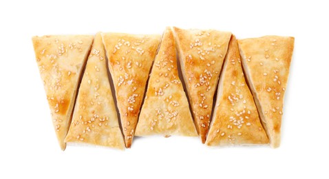 Delicious fresh puff pastries isolated on white, top view