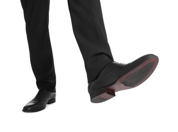 Businessman in leather shoes on white background, closeup