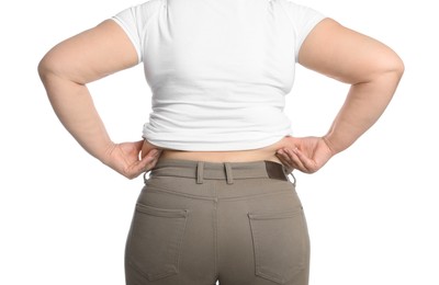 Photo of Overweight woman in tight t-shirt and trousers on white background, closeup. Back view