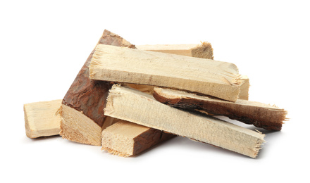 Photo of Cut firewood on white background. Heating in winter