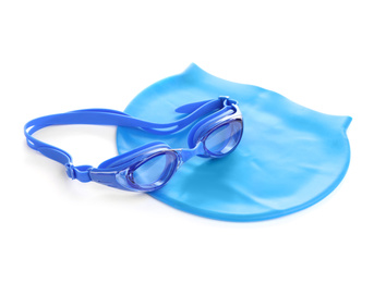 Photo of Swim goggles and cap isolated on white. Beach objects