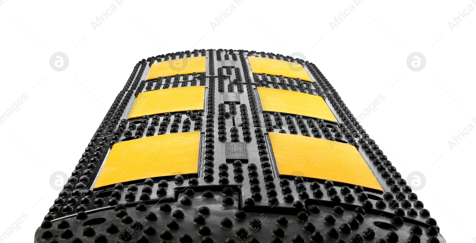 Photo of Speed bump isolated on white. Traffic calming device