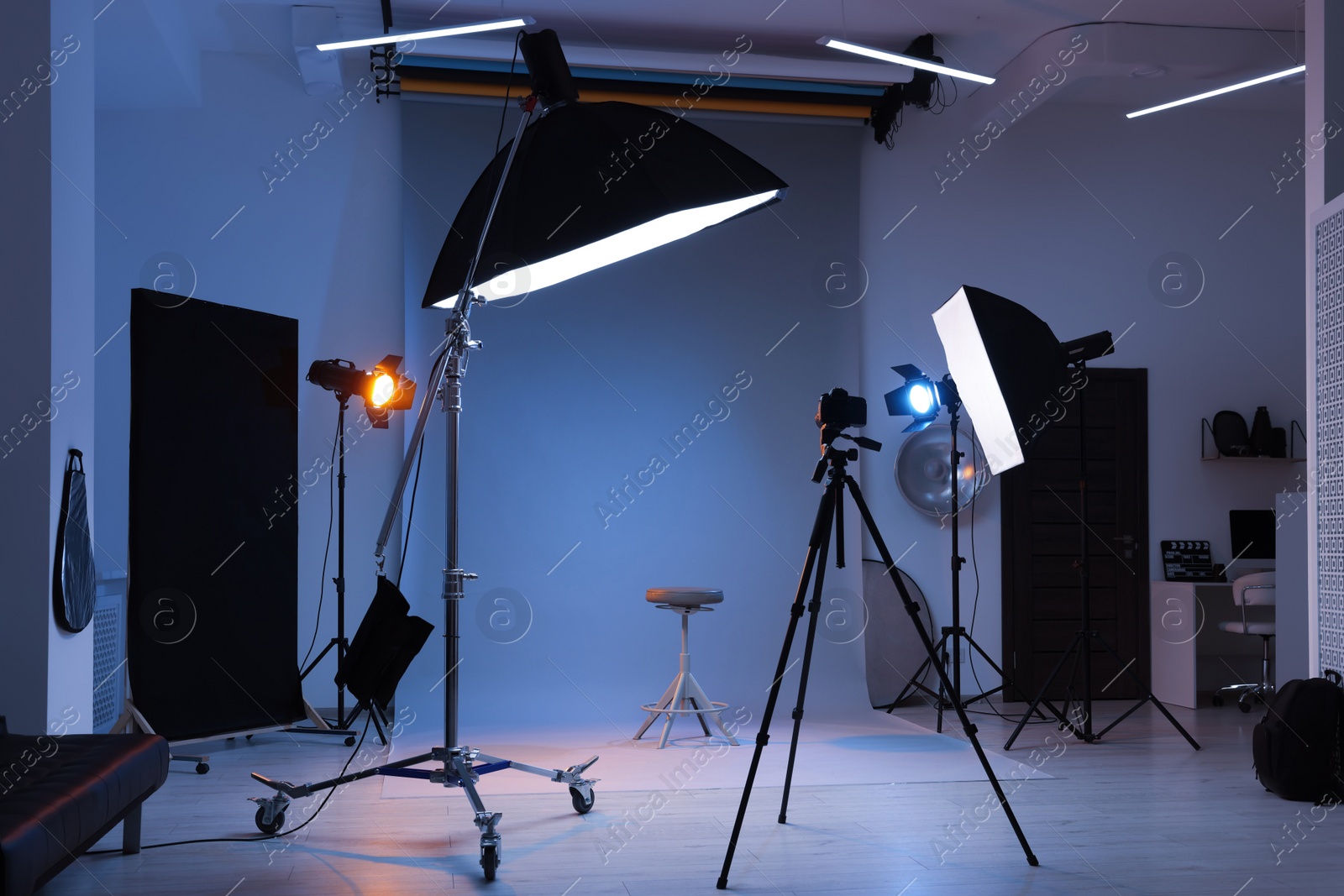 Photo of Casting call. Chair and different equipment in modern studio