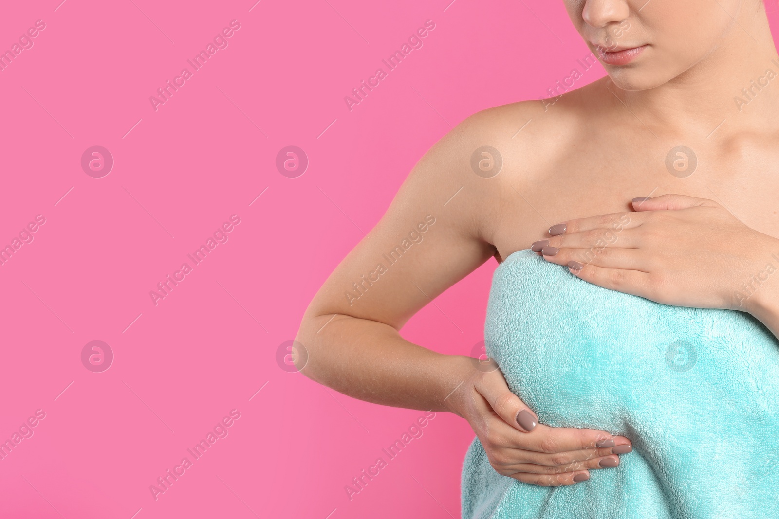 Photo of Woman checking her breast on color background, closeup. Space for text