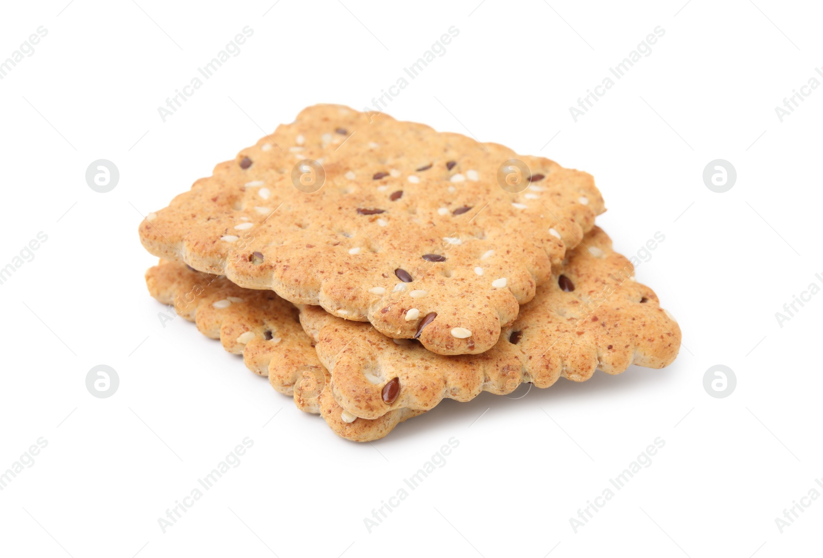 Photo of Stack of cereal crackers with flax and sesame seeds isolated on white