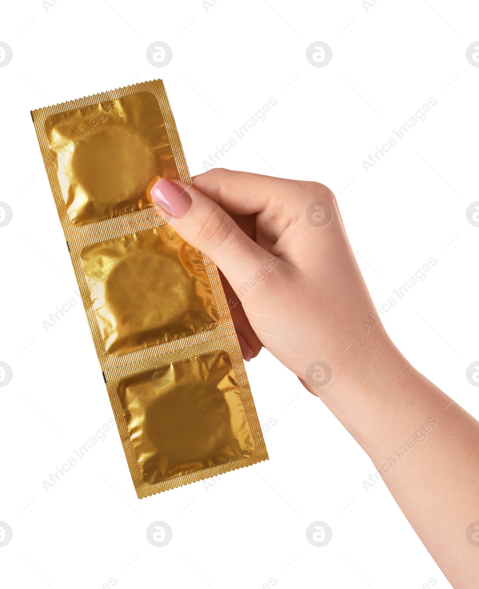 Photo of Woman holding condoms on white background, closeup