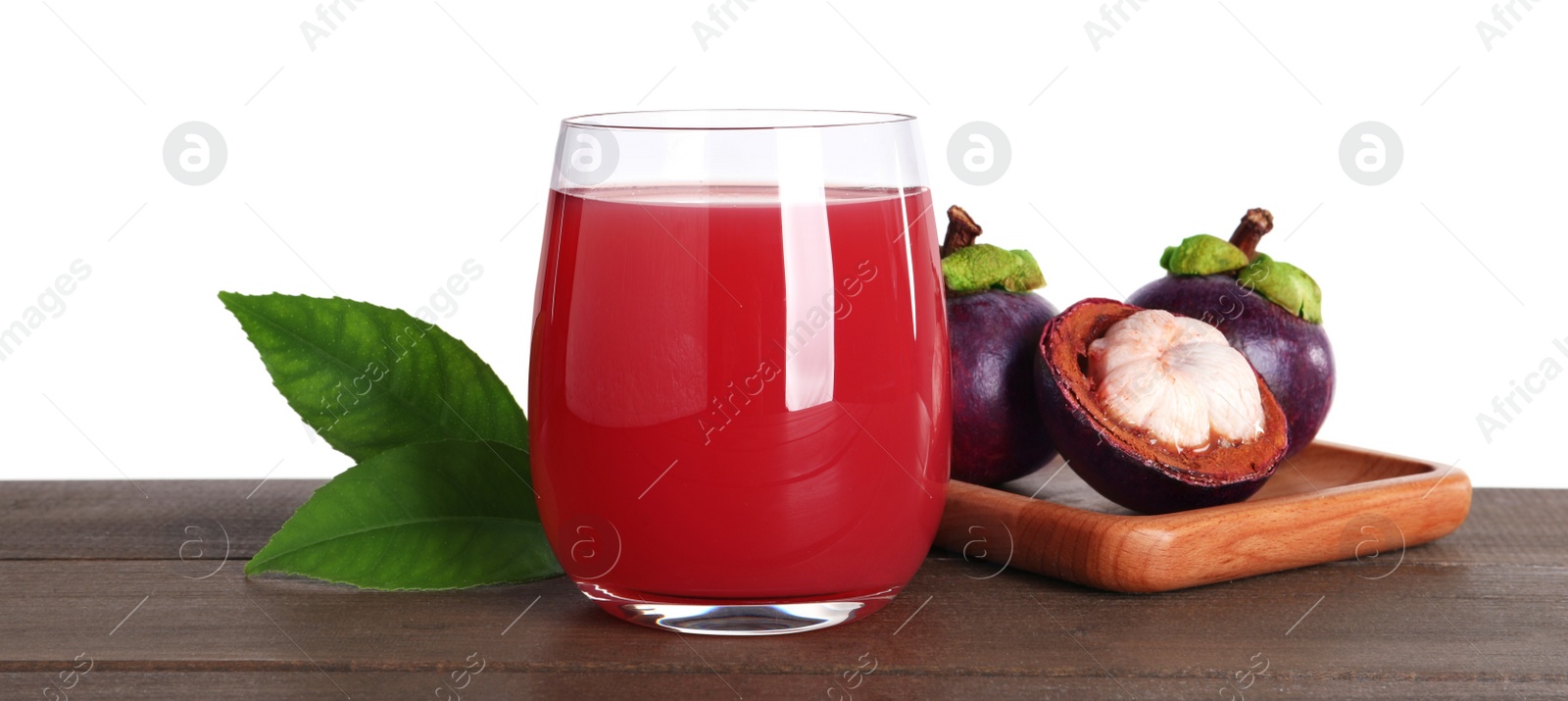 Photo of Delicious mangosteen juice and fresh fruits on wooden table against white background