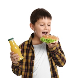 Happy boy holding sandwich and bottle of juice on white background. Healthy food for school lunch
