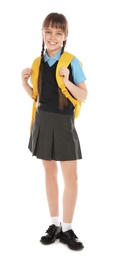 Full length portrait of cute girl in school uniform with backpack on white background