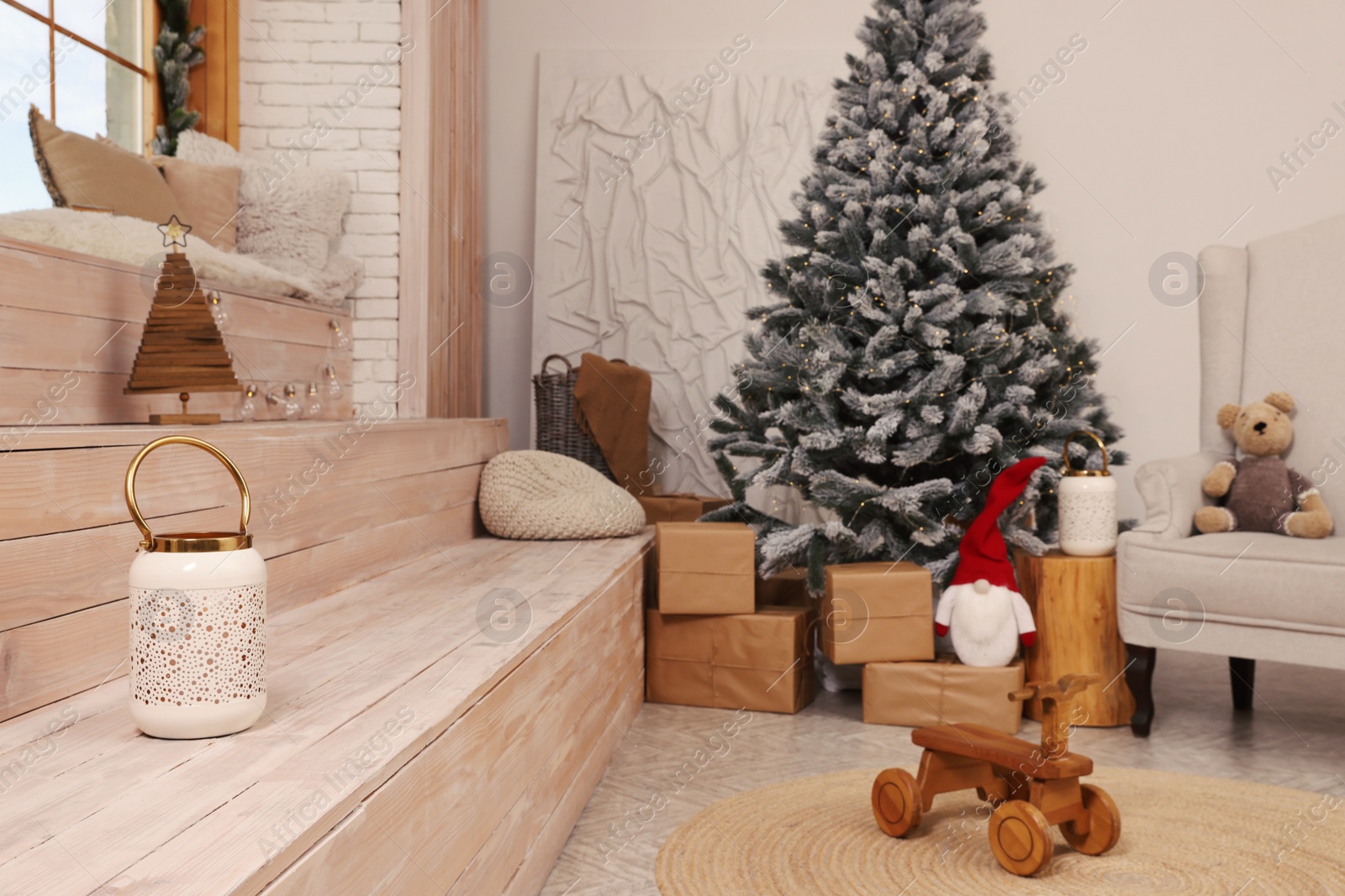 Photo of Stylish room interior with Christmas tree and festive decor