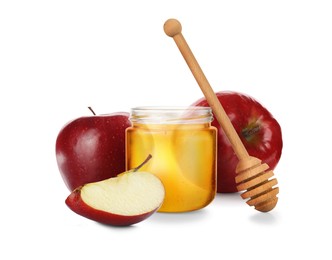 Honey in glass jar, apples and dipper isolated on white