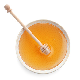 Bowl of organic honey and dipper isolated on white, top view