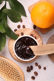 Photo of Flat lay composition with natural body scrub and fresh ingredients on white table. Anti cellulite treatment