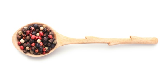 Photo of Wooden spoon with different pepper grains on white background, top view