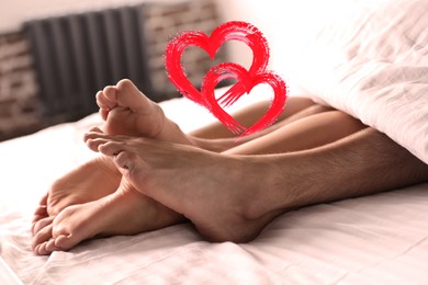 Image of Illustration of hearts and passionate young couple having sex on bed at home, closeup of legs