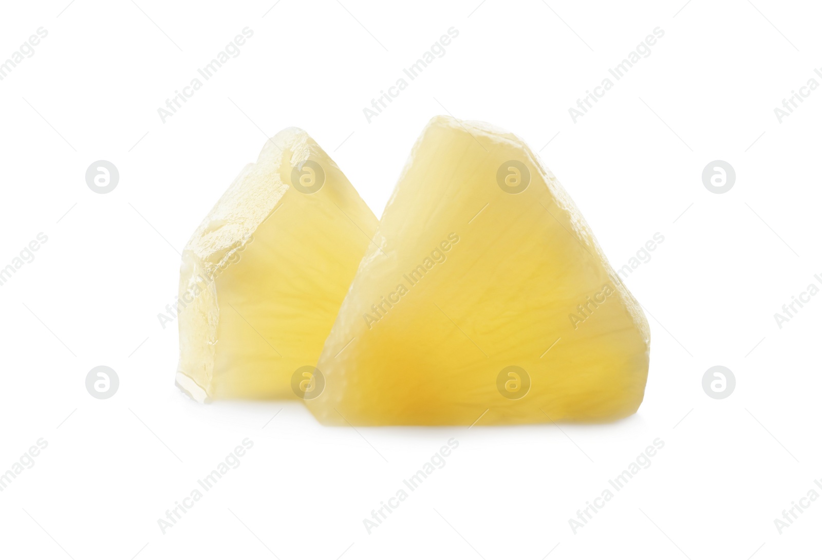 Photo of Pieces of canned pineapple isolated on white