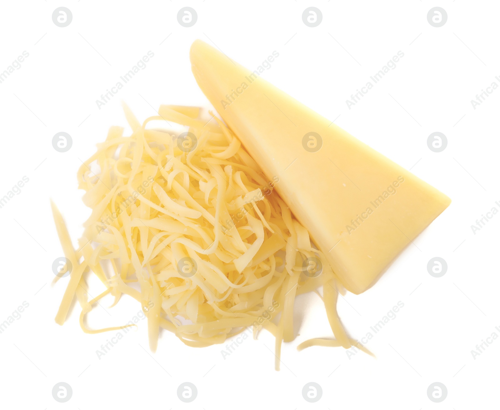 Photo of Grated and whole piece of cheese isolated on white, top view