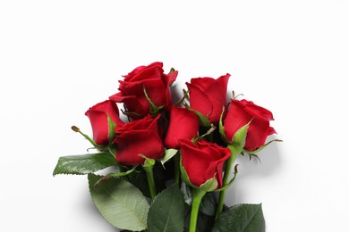 Photo of Beautiful red roses on white background, top view