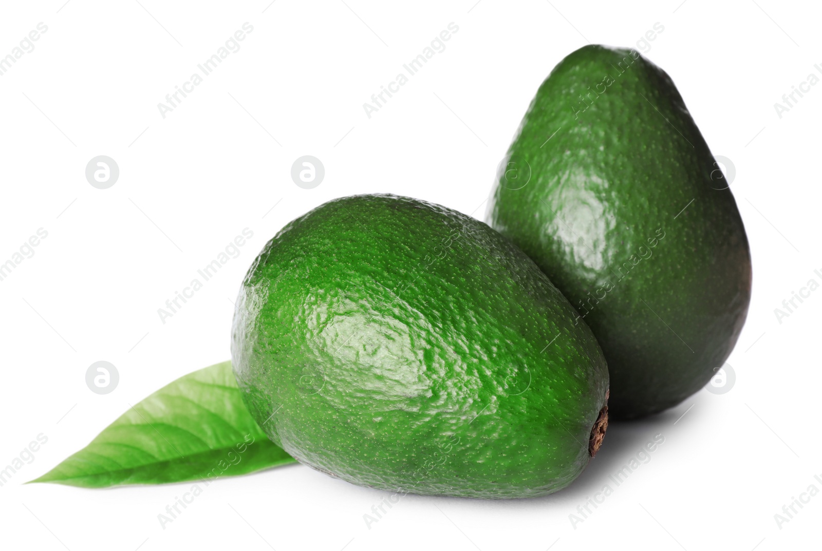 Photo of Tasty fresh ripe avocados isolated on white