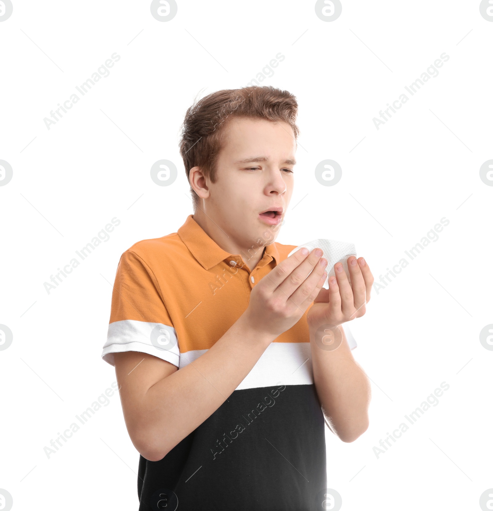 Photo of Teenage boy suffering from cough isolated on white