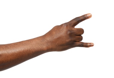 Photo of African-American man showing ROCK gesture on white background, closeup