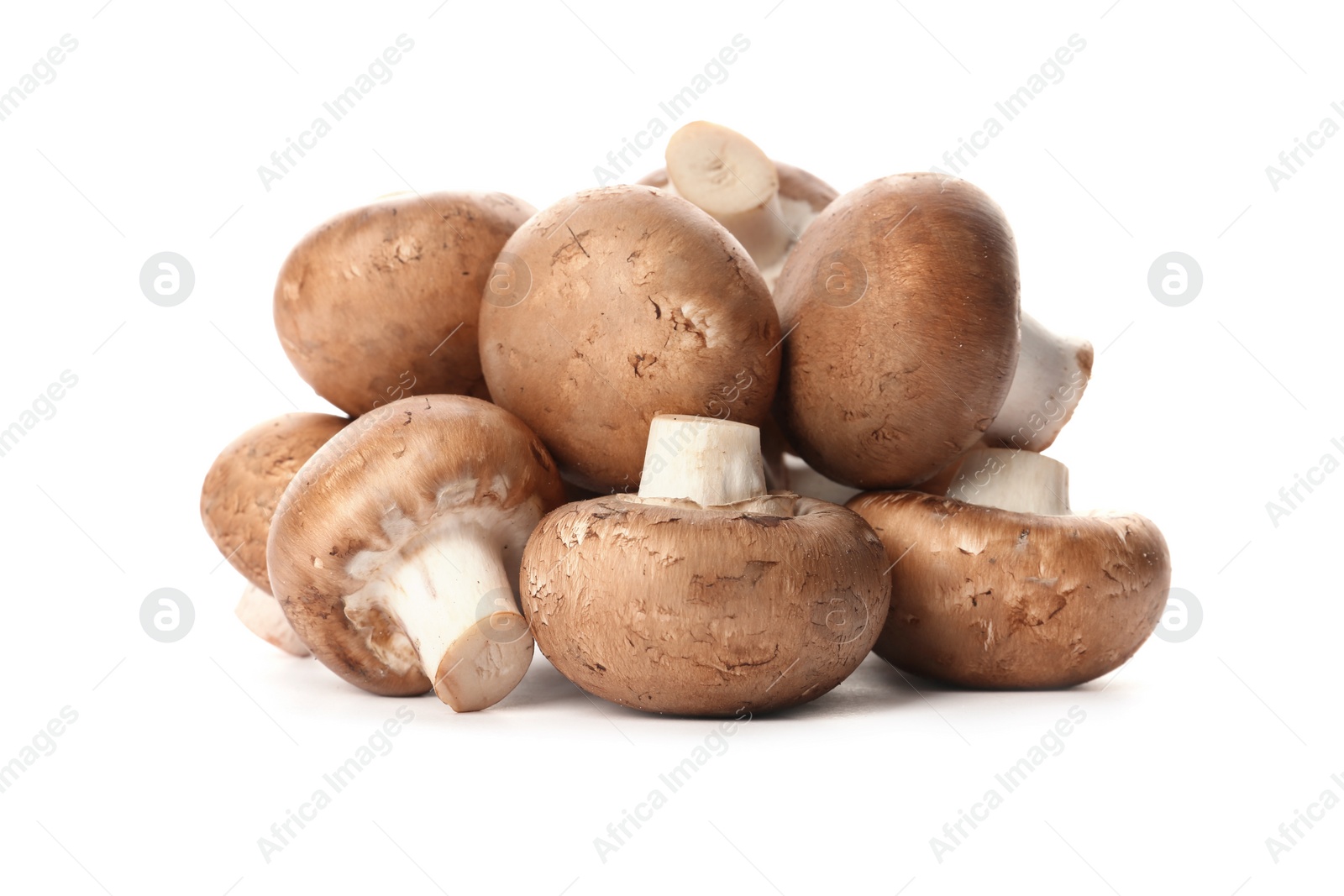 Photo of Fresh champignon mushrooms isolated on white. Healthy food