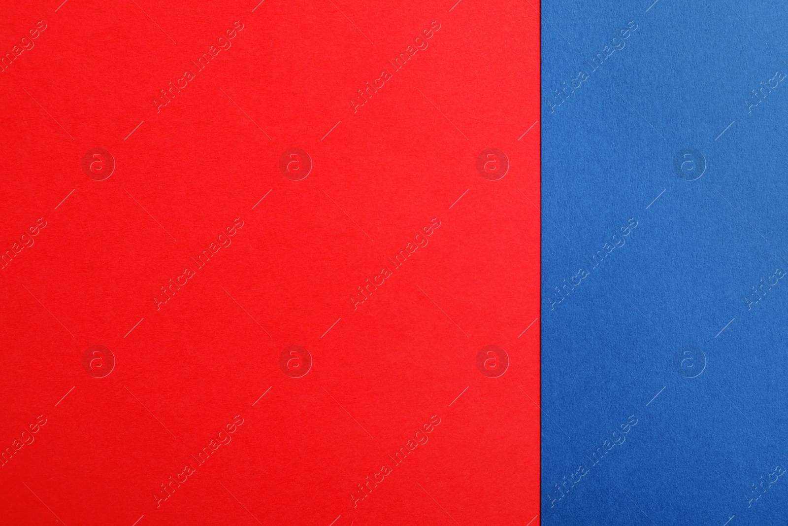 Photo of Blue and red paper sheets as colorful background, top view