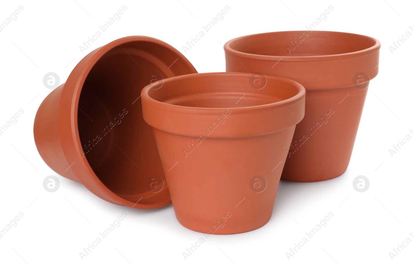 Photo of Empty clay flower pots isolated on white