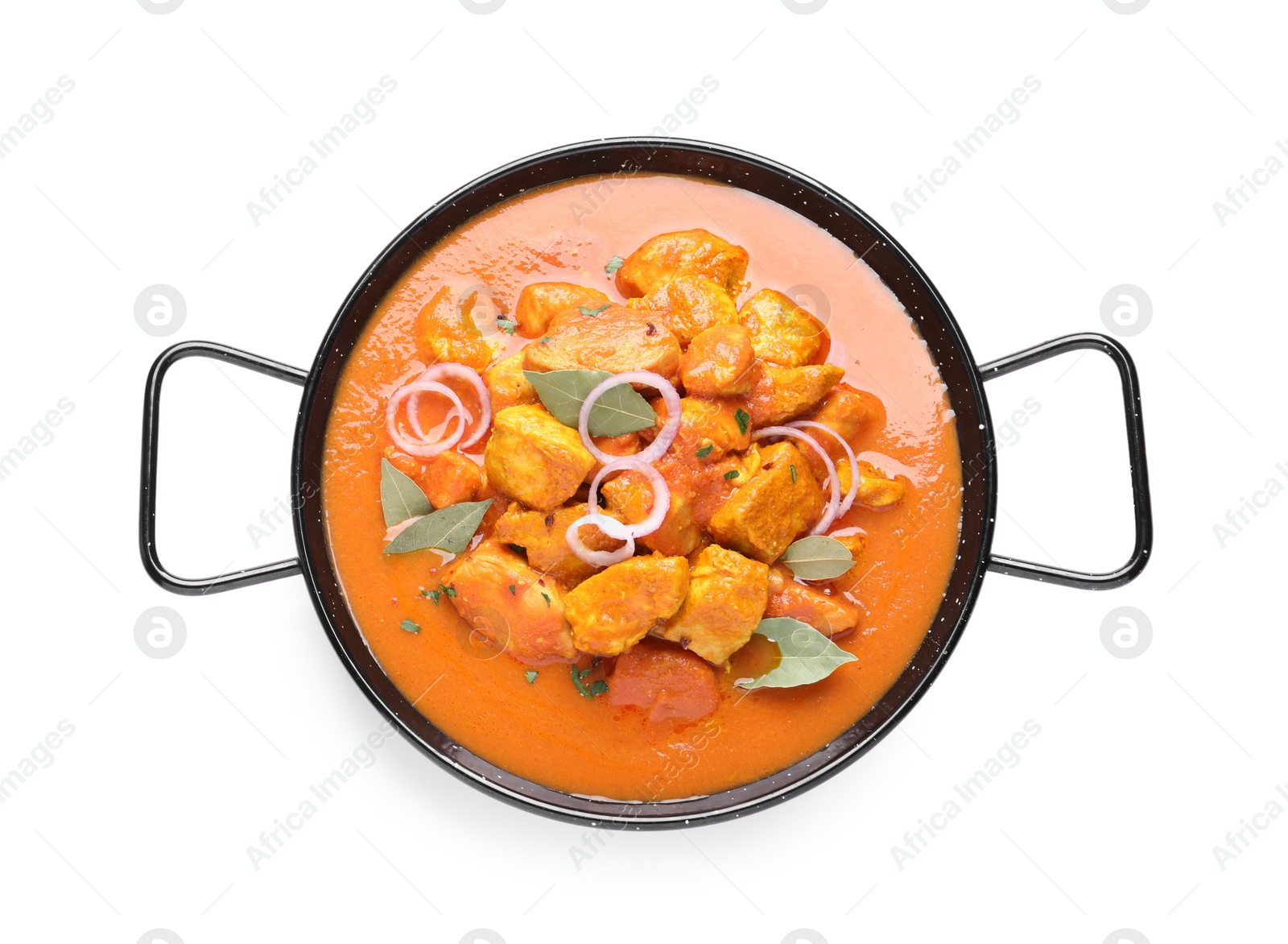 Photo of Delicious chicken curry in pan on white background, top view