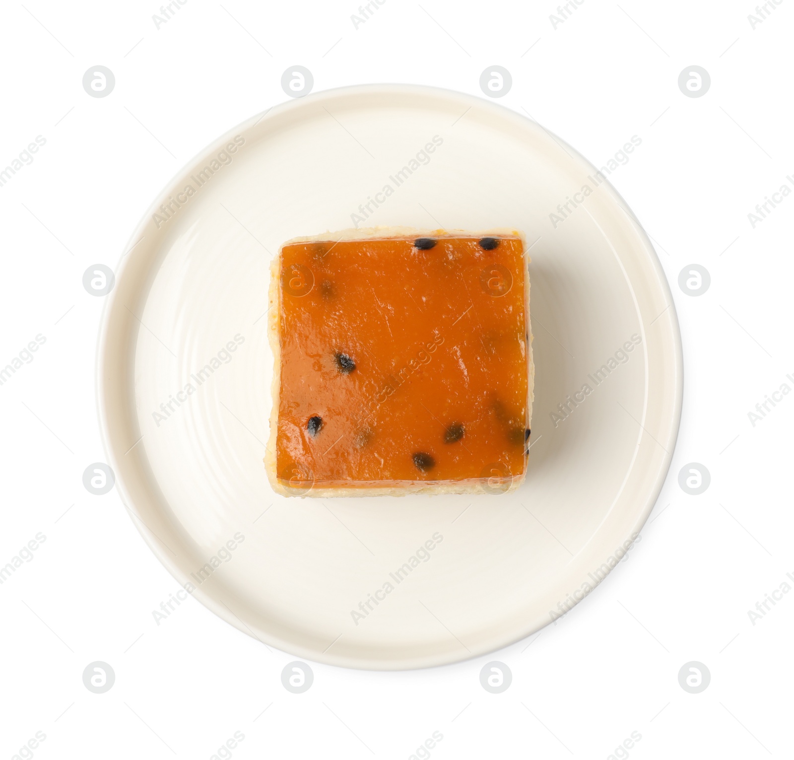 Photo of Piece of cheesecake with jelly on white background, top view