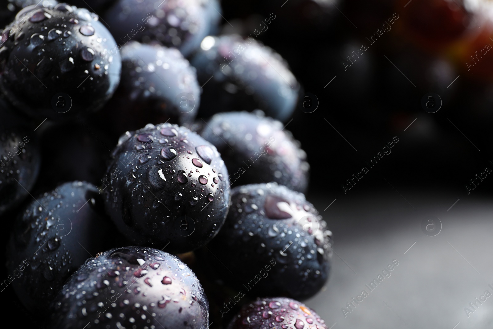 Photo of Bunch of fresh ripe juicy grapes as background, closeup