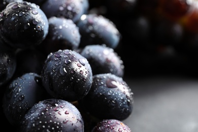 Photo of Bunch of fresh ripe juicy grapes as background, closeup