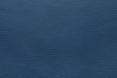 Texture of blue leather as background, closeup