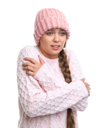 Young woman suffering from cold on white background