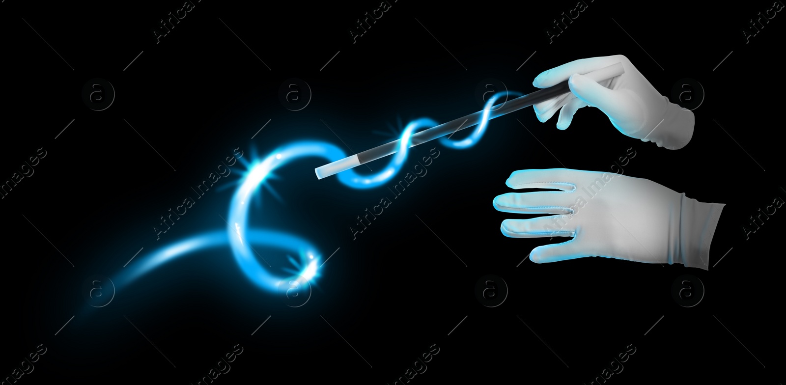 Image of Magician with magic wand performing trick on black background, closeup. Banner design