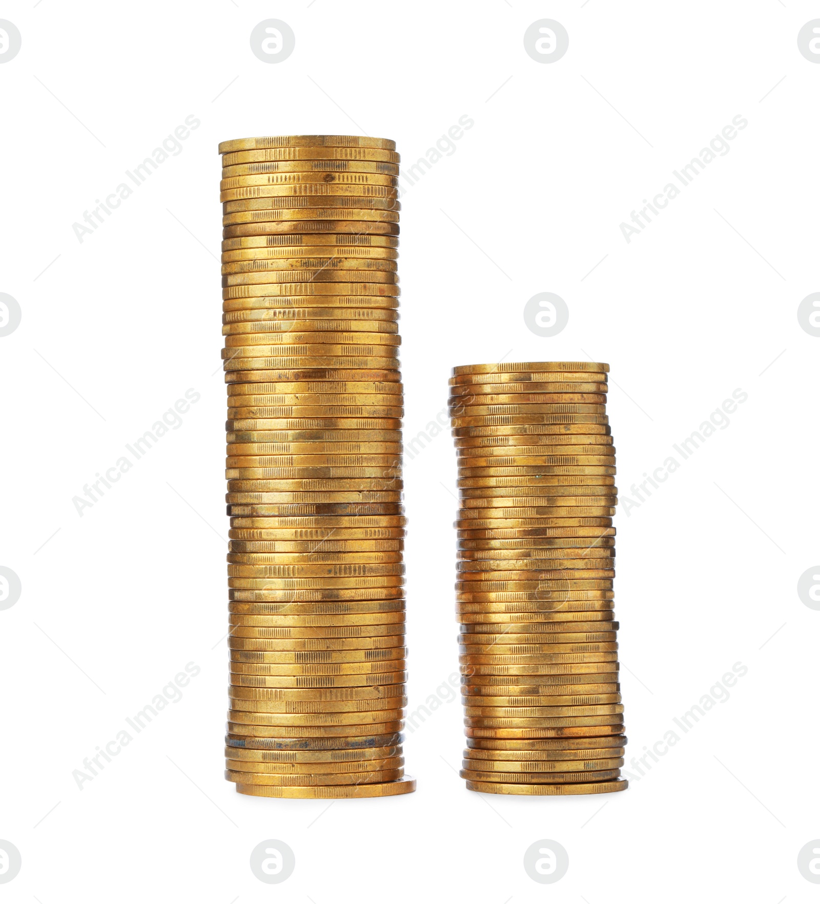 Photo of Stacks of golden coins on white background