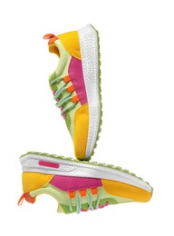 Photo of Pair of stylish colorful sneakers on white background