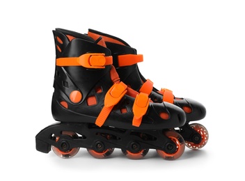 Photo of Pair of inline roller skates on white background