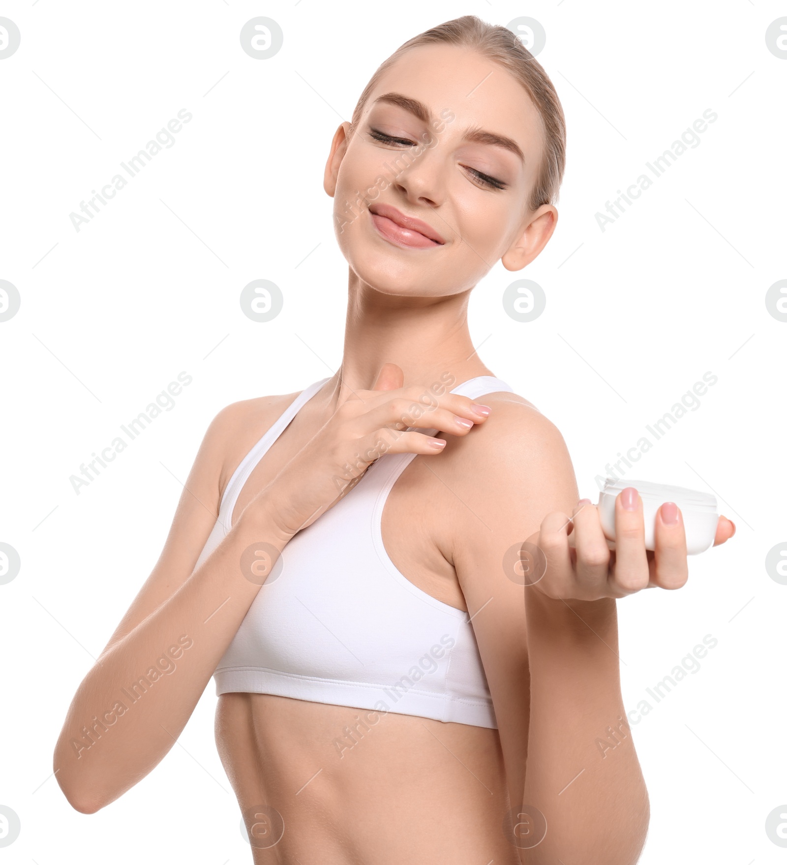 Photo of Young woman with jar of body cream on white background