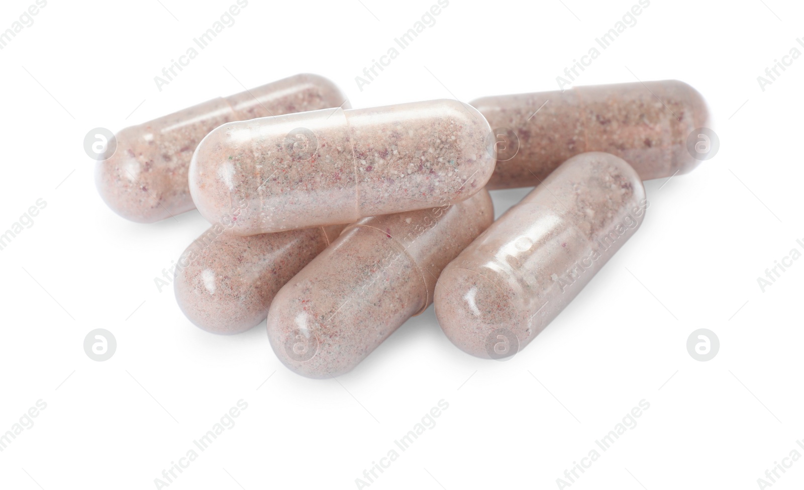 Photo of Many transparent gelatin capsules on white background