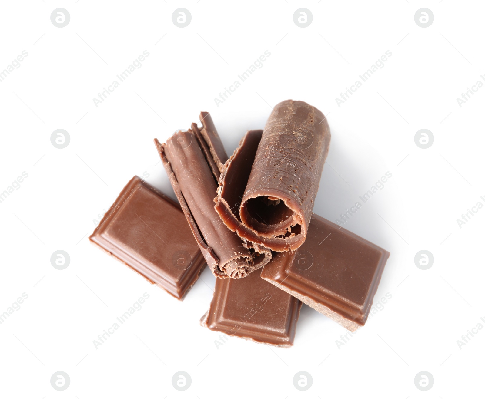 Photo of Chocolate curls and pieces isolated on white, top view