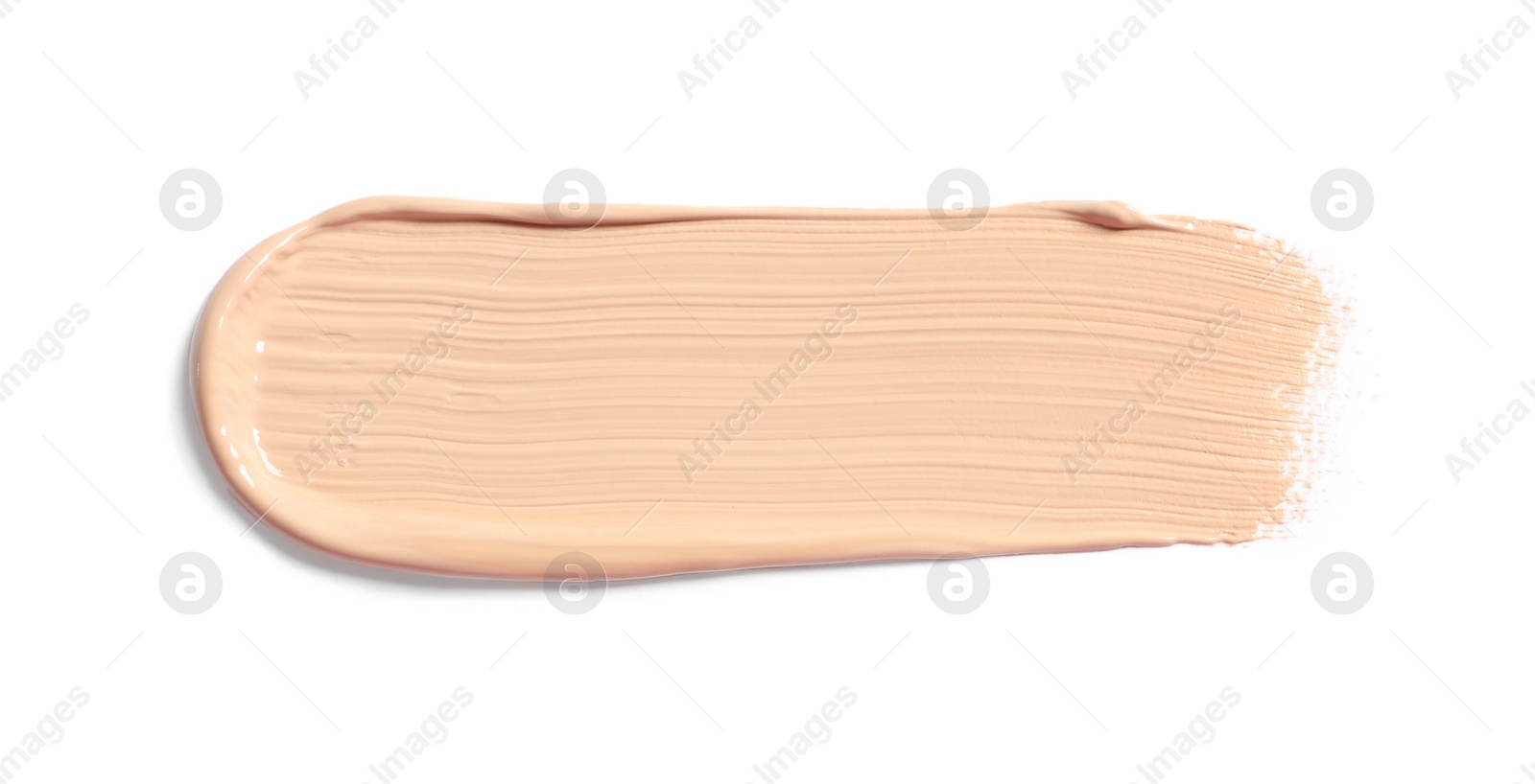 Photo of Smear of skin foundation isolated on white, top view