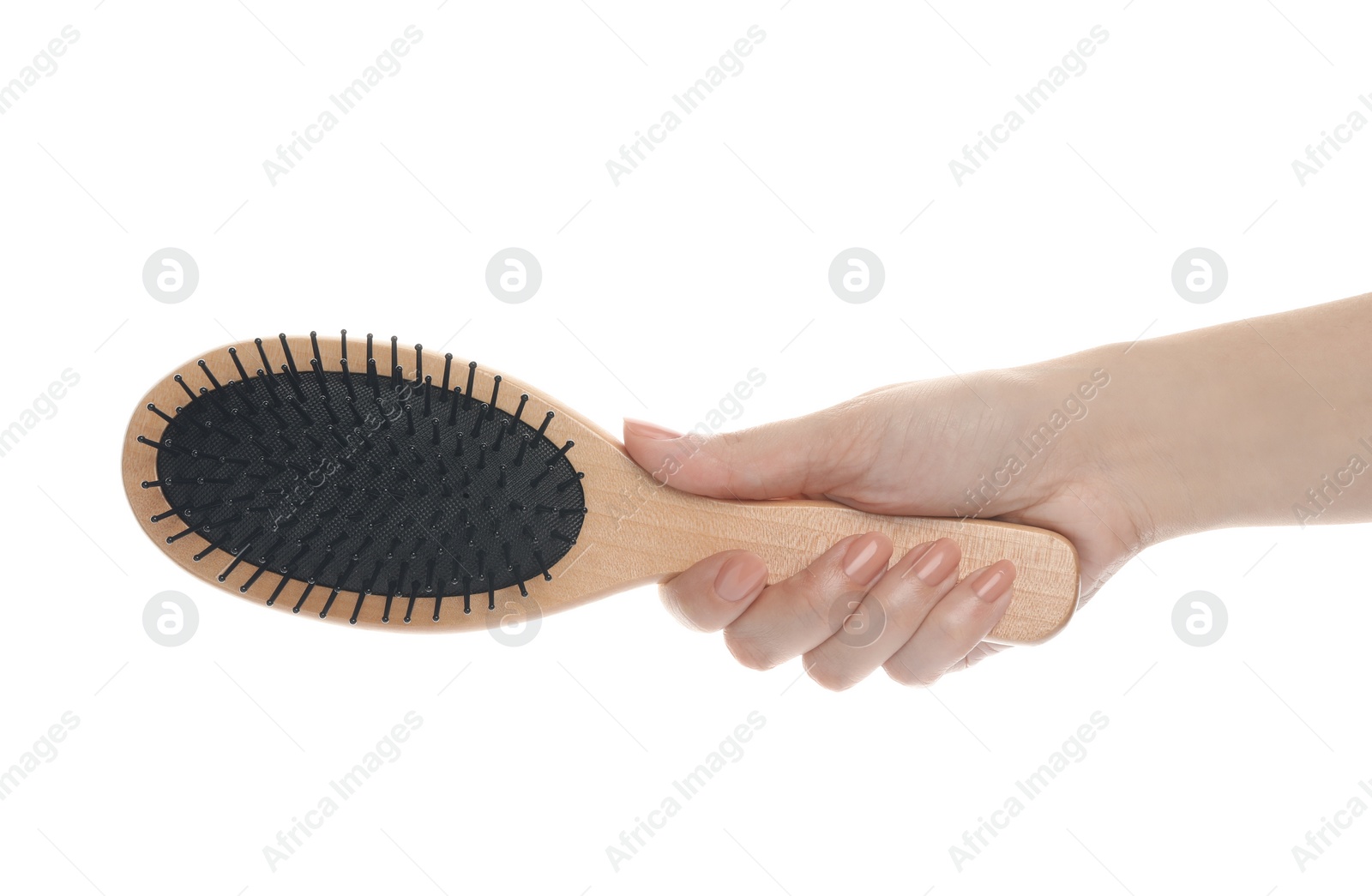 Photo of Woman holding wooden hair brush on white background, closeup